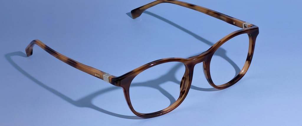 Round tortoiseshell Hugo Boss frames with arms opened facing right