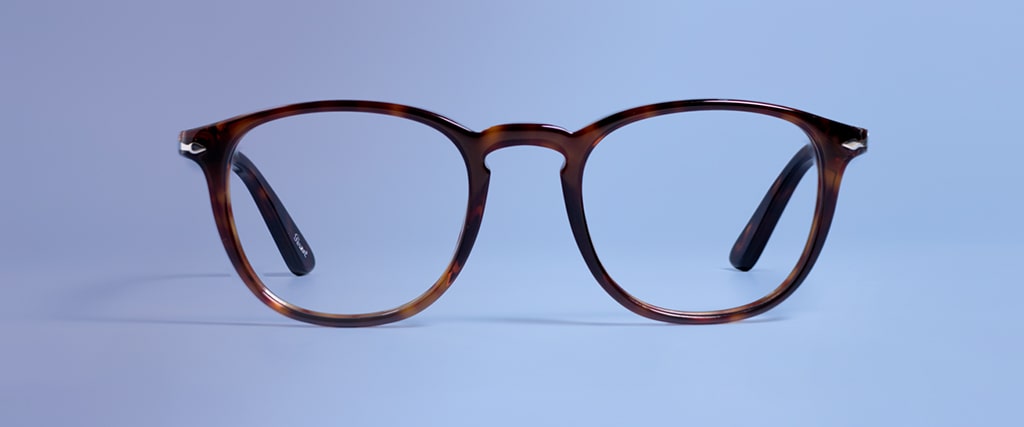 Round tortoiseshell Persol frames with arms opened facing forwards