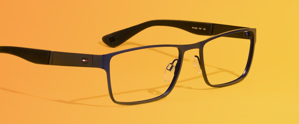 Blue metal rectangular Tommy Hilfiger frames close-up with arms open facing to the right