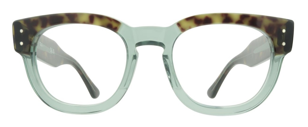 Rounded glasses with large lenses and a frame made from semi-transparent green acetate with a tortoiseshell brow