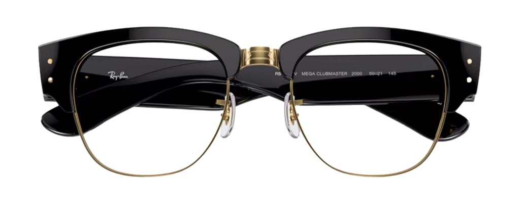 A large Ray-Ban Clubmaster frame made of acetate and metal. It has a thick brow and temples with shiny gold metal accents and rubber nose pads.