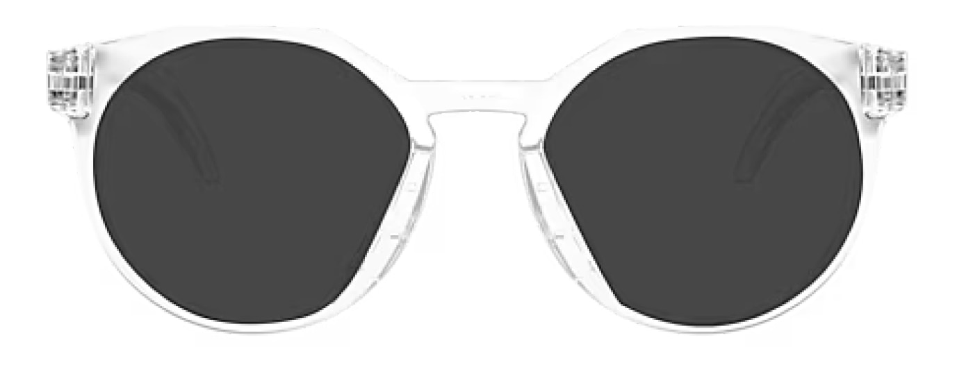 Front view of round transparent Oakley sunglasses made of plastic with a keyhole bridge. 