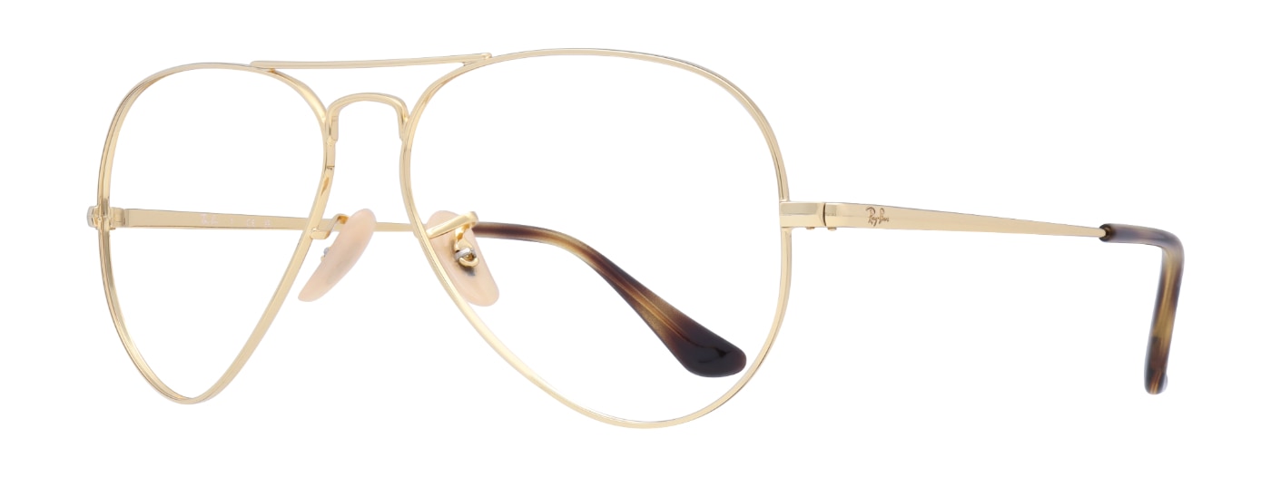 A pair of gold Ray-Ban Aviator glasses, made of metal with acetate tortoiseshell tips. The glasses are at a sideways angle. 