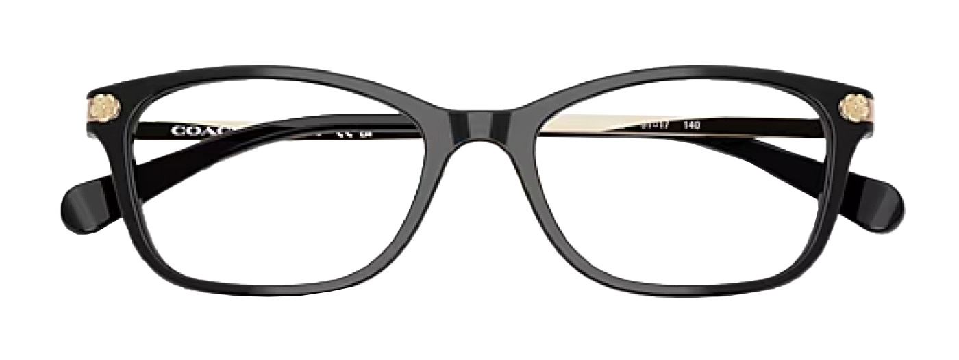 A pair of pillow-shaped Coach glasses. The glasses are black with gold branded temples. The hinges have a unique floral design. 