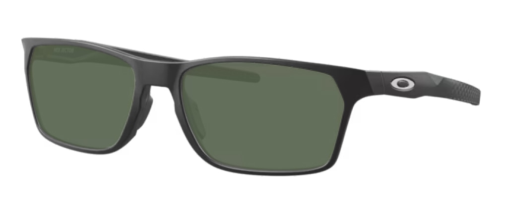 A pair of rectangular Oakley sunglasses made of black plastic material angled to one side, featuring green lenses and the Oakley 'O' logo on the arms. 