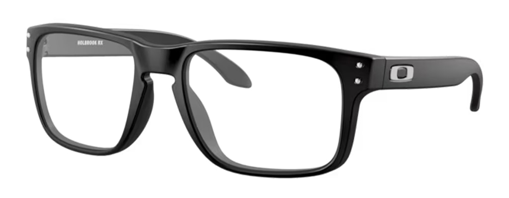 Side profile of a pair of black Oakley® Holbrook™ glasses made of black nylon-based material, featuring metal rivets, a keyhole bridge and the signature Oakley 'O' symbol along the temples.
