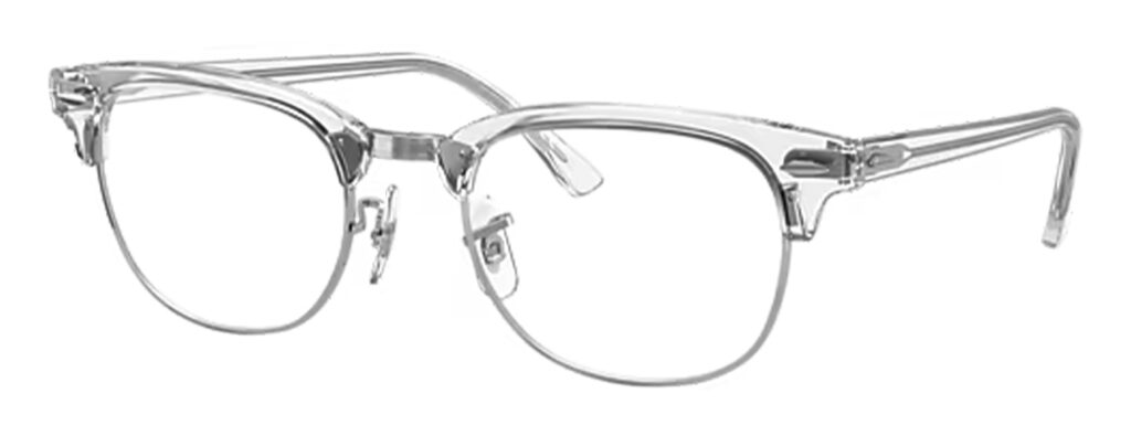 A close up of a pair of Ray-Ban Clubmaster glasses, featuring a transparent acetate brow, silver metal accents, and adjustable nose pads.