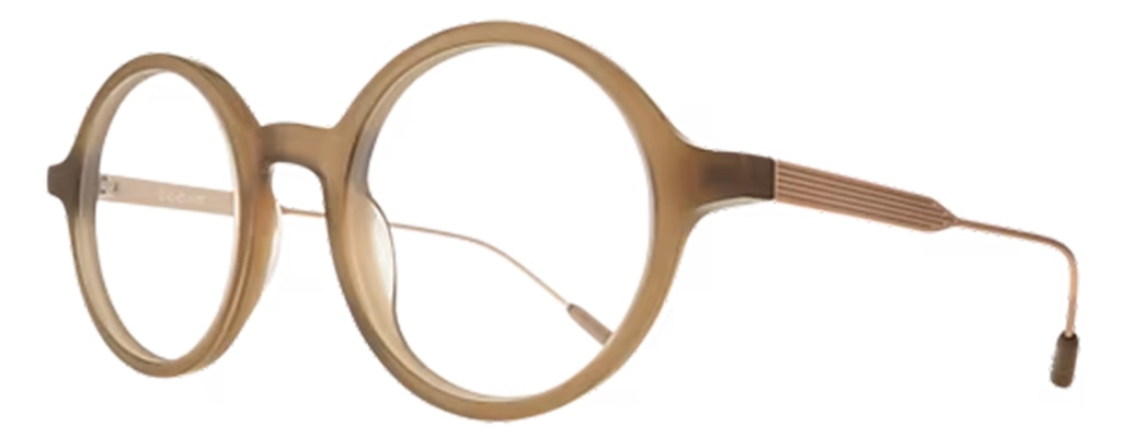 Side profile of large round beige acetate glasses with gold metal temples.