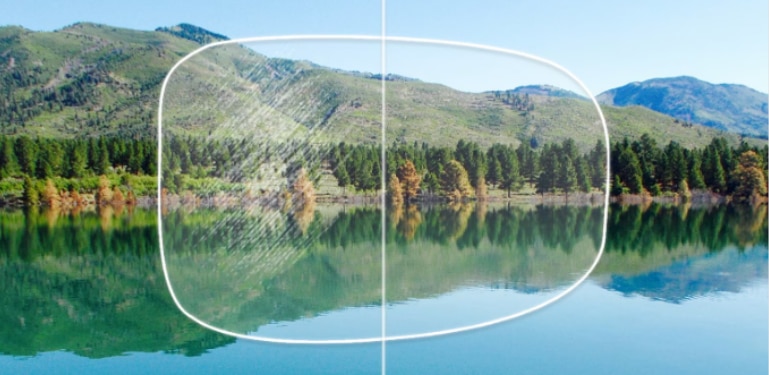 Illustration showing a lens with anti-scratch protection over a landscape scene. The left side of the lens appears covered in scratches and surface marks, while the right side remains clear and sharp, demonstrating how scratch-resistant coatings help maintain lens clarity and improve visual performance.