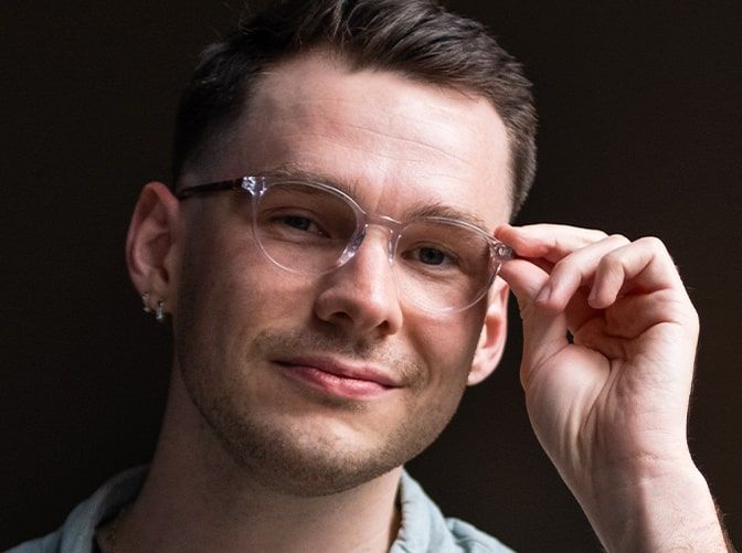 Smiling man wearing Arden Luna glasses