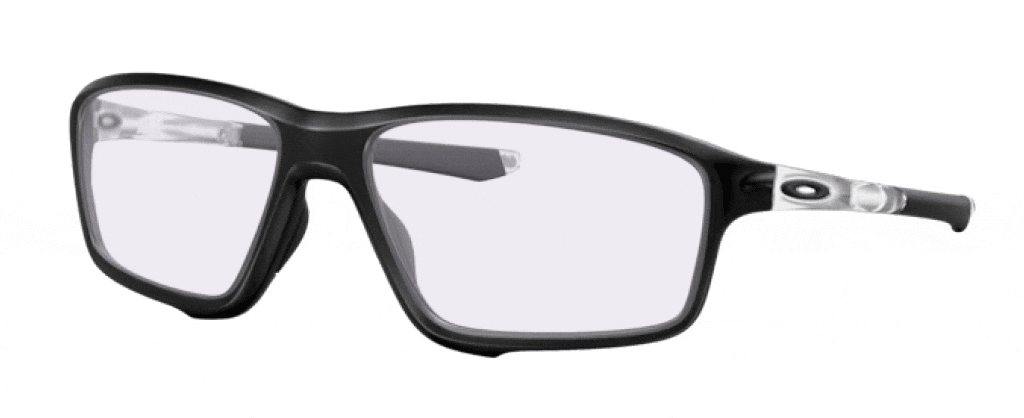 A pair of square Oakley sunglasses made of black plastic material angled to one side, featuring purple transitioning lenses and the Oakley 'O' logo on the arms.