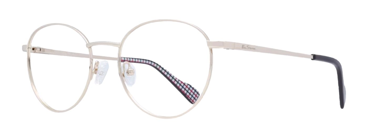Ben Sherman glasses, turned to one side. The lenses are round and the frame is made of silver metal with acetate tips which are dark blue and have a check print on the inside.