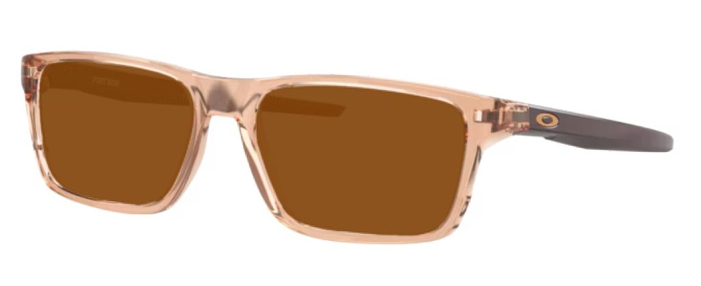 A pair of large rectangular Oakley sunglasses made of transparent-sepia and brown plastic material angled to one side, featuring amber lenses and the Oakley 'O' logo on the arms.
