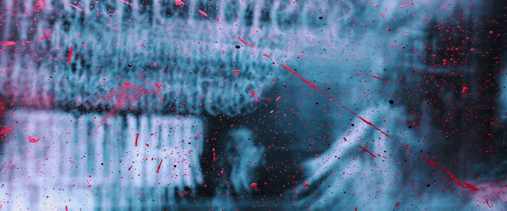 Crime scene with splatters across glass