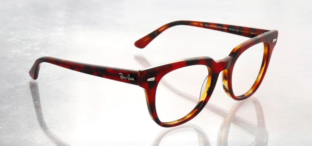 Pair of tortoiseshell Ray-Ban frames facing to the right