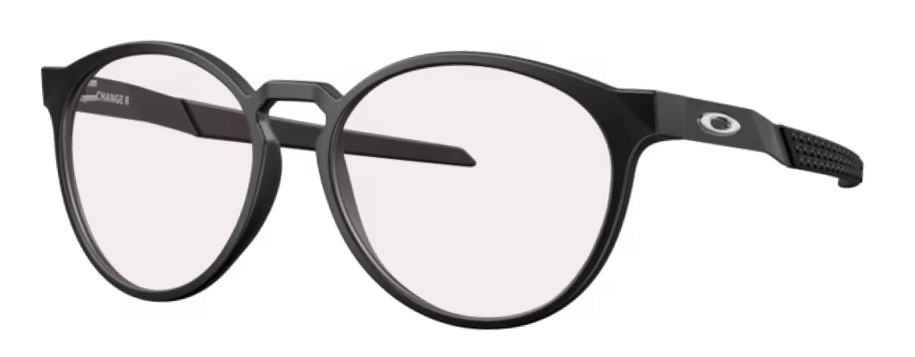 Oakley Exchange R large round sunglasses in black with ruby transitioning lenses for changing light conditions.
