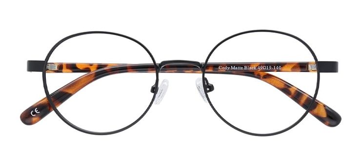 A round black metal frame with tortoiseshell arms