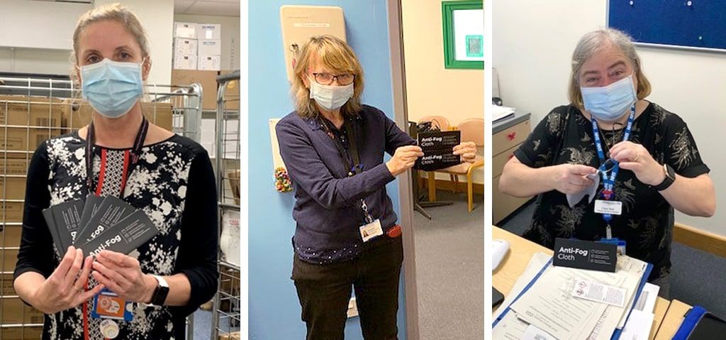Three separate images merged together in a collage, depicting three NHS staff wearing masks and holding ant-fog cloths in a medical setting.