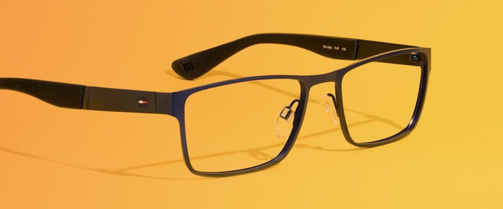 Blue metal rectangular Tommy Hilfiger frames close-up with arms open facing to the right
