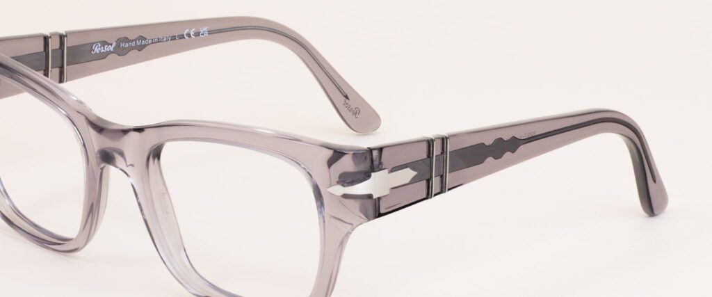 Square clear Persol frame with arms open angled facing to the left