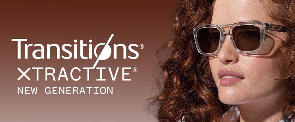 A young woman with thick curly hair wearing transparent square sunglasses featuring brown Transitions® XTRActive® lenses, set against a brown background with the white Transitions® XTRActive® logo beside her.