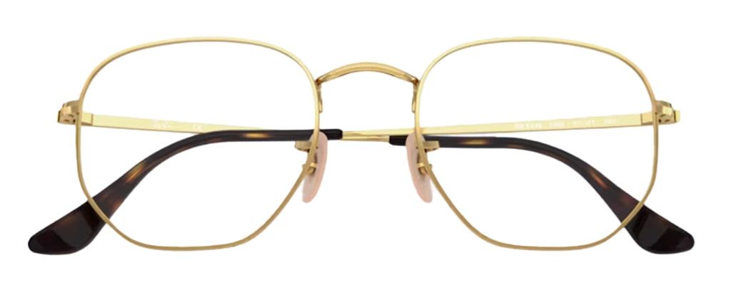 A hexagonal gold metal frame with rubber nose pads and tortoiseshell acetate temple tips. The frame is in a folded-up position.