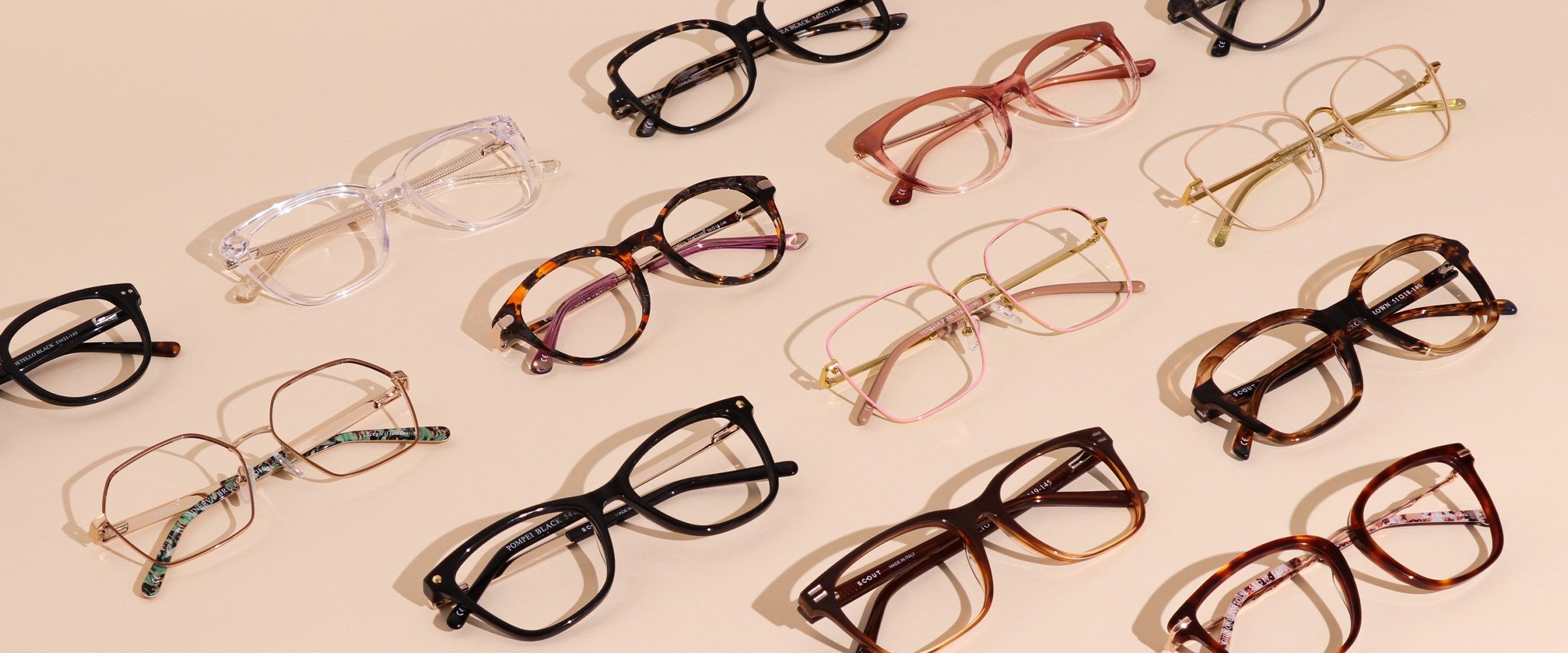 Flatlay Collection of Scout: Made in Italy frames on a beige background positioned in rows