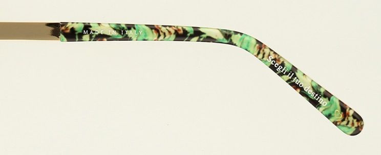 Close-up of Green floral on inside arm showing inscription