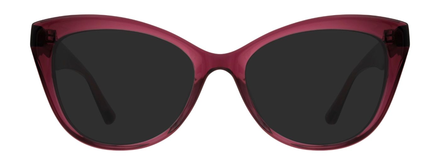 Small cat-eye sunglasses, made of raspberry pink acetate. The temples are bevelled.