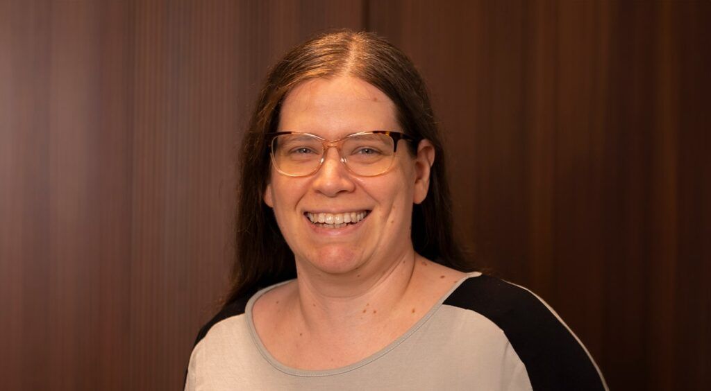 Female wearing cat-eye ombre frames