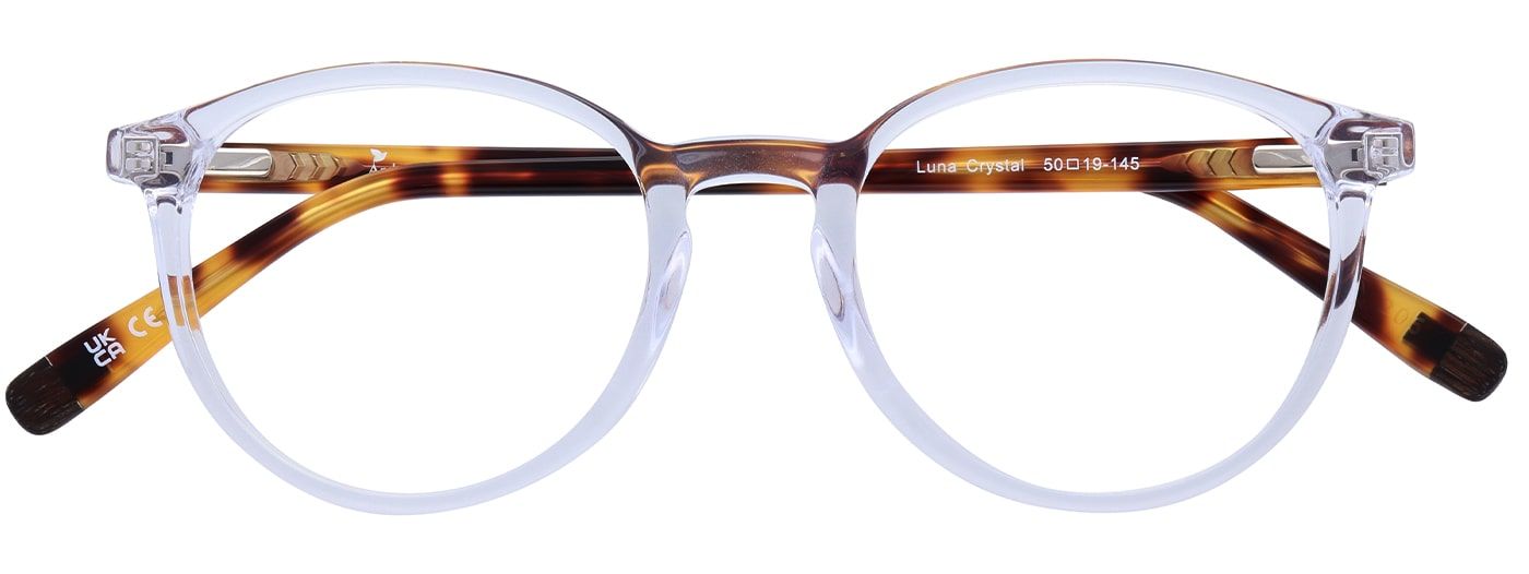 A small transparent phantos frame made of bio-based acetate. It has tortoiseshell temples and a keyhole bridge. It is in a folded position.