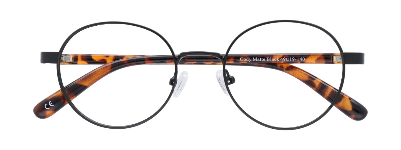 A pair of round metal glasses in matte black with tortoiseshell acetate temples. The glasses are folded up.