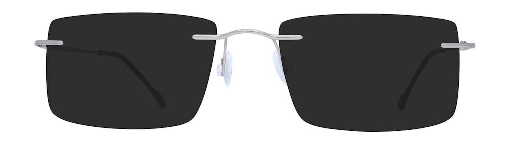 A rimless pair of sunglasses with gunmetal arms and rectangular lenses