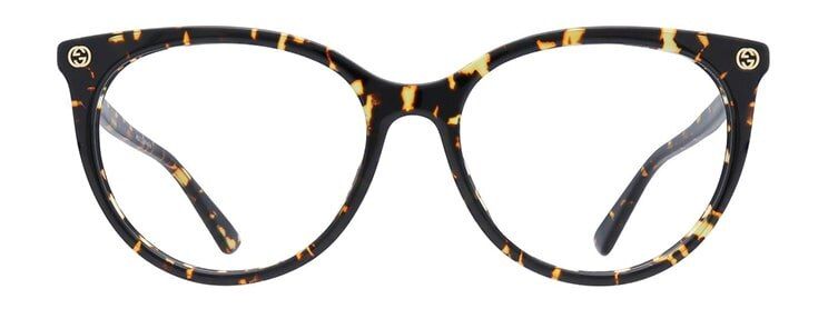 Havana Gucci oval glasses with gold-tone branding on the corners and a low-bridge fit.