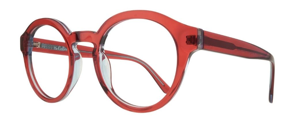 A bright red round acetate frame with a clear under layer. It features a keyhole bridge.