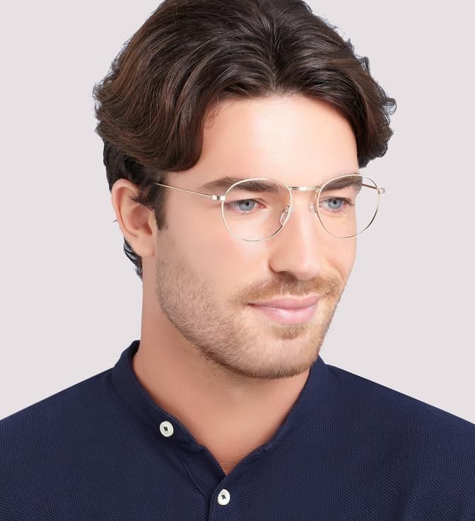 Man with medium-length hair wearing London Retro Camden glasses