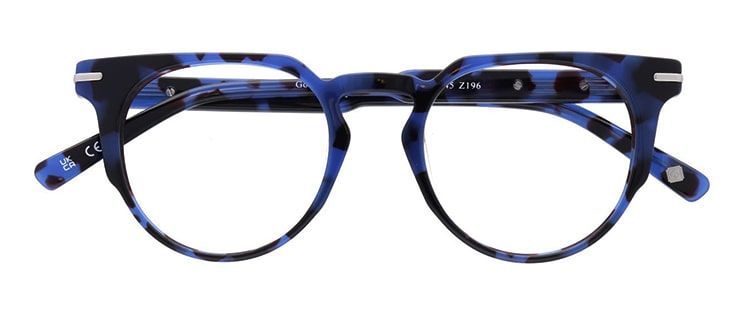 Round blue tortoiseshell frames with straight edges at the tops of the frames from London Retro range