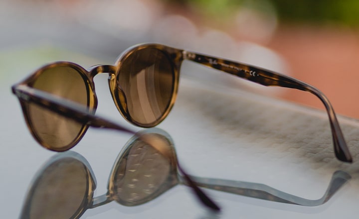 A pair of tortoiseshell sunglasses