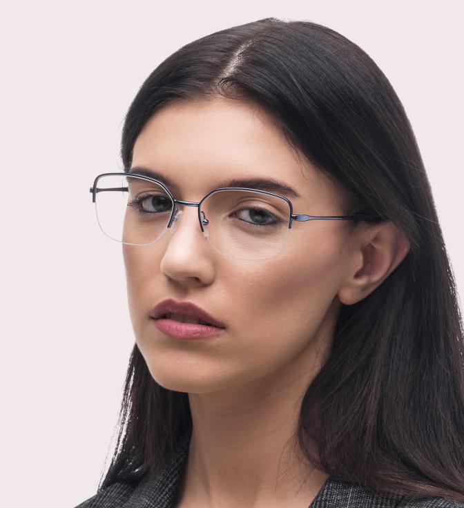 Woman with long dark hair wearing Moonglow glasses