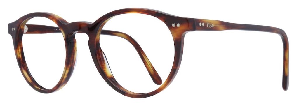 A close up of a pair of Havana acetate phantos glasses, featuring a keyhole bridge, metal rivets, and Polo Ralph Lauren branding along the temples.