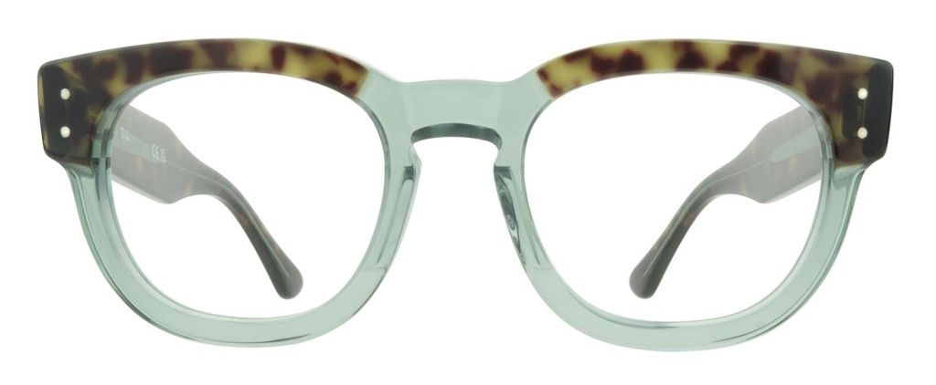A square glasses frame with rounded edges, made of transparent green acetate with tortoiseshell accents above the brows